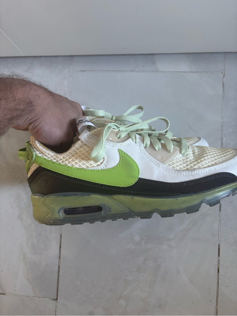 Nike Shoe Interior with White Lining and Blue-Green Insole
